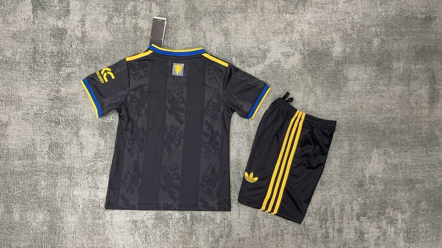 Manchester United Tercera Camiseta 2025/26 - Niños