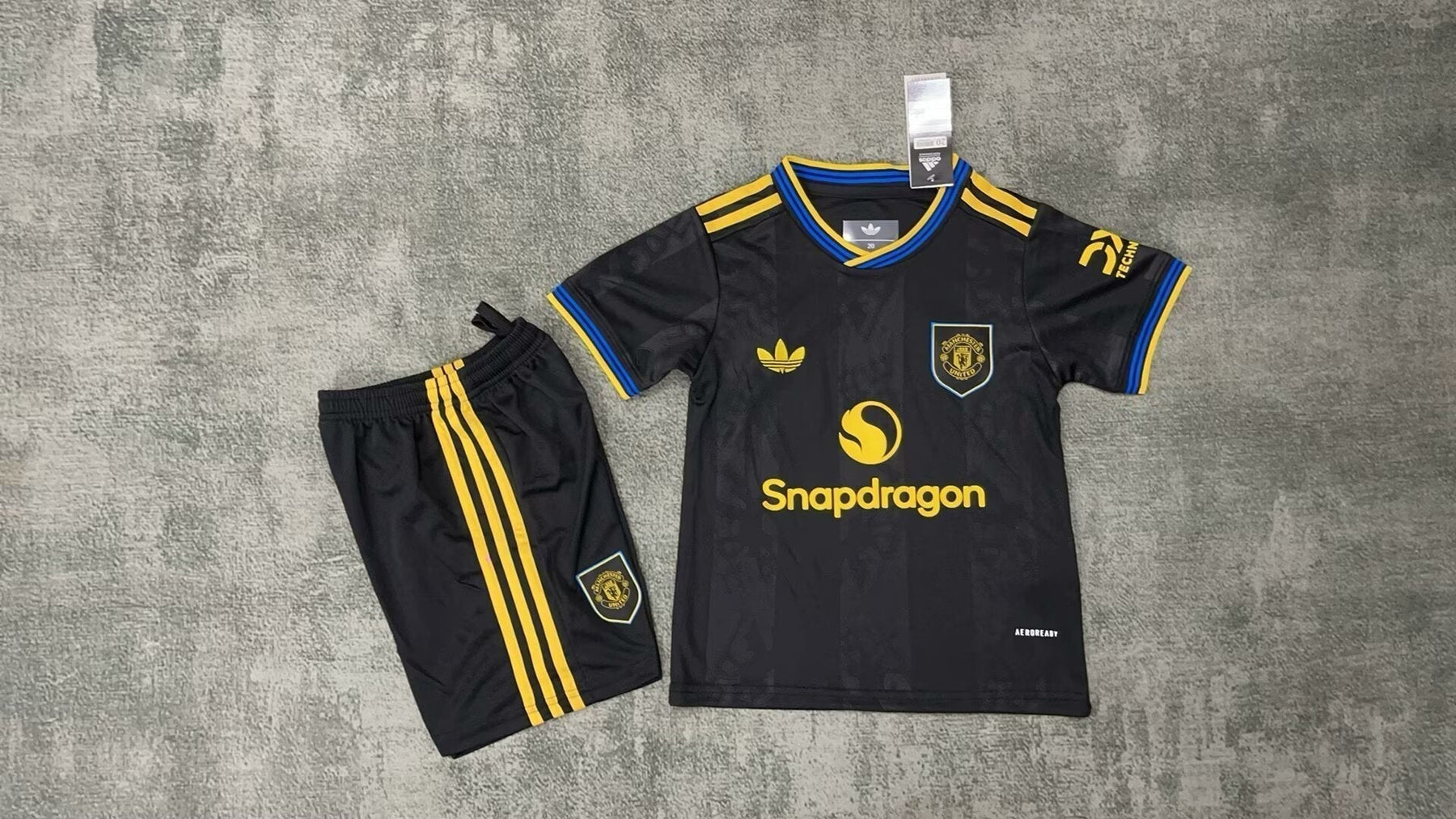 Manchester United Tercera Camiseta 2025/26 - Niños